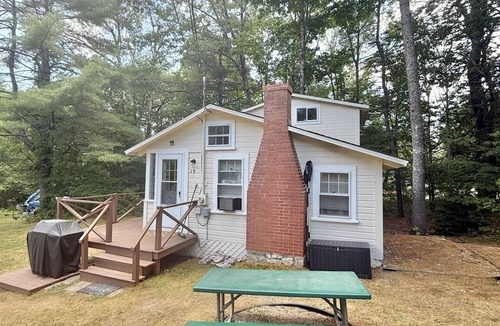 South Casco Cabin | STEPS AWAY FROM A SHARED SANDY BEACH. BOAT SLIP ON THOMAS POND
