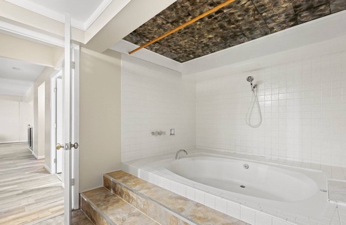 Hampden South Condo | Stunning DTC Condo: Mountain Views, Pool, Parking!