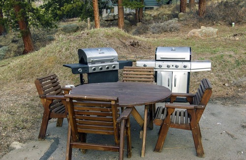Estes Park Condo | Suite with Two person Jetted tub, Private Patio with Grill and River View.