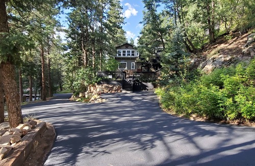 Evergreen House | Timeless 100 Year Old Creekside Cabin near Red Rocks. King size bed.