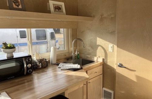 Pear Park House | Tiny home with one queen bed on main floor.