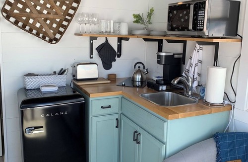 Meeker House | Tiny Home with one Queen bed on main floor and one Queen bed in loft. Sleeps: 4