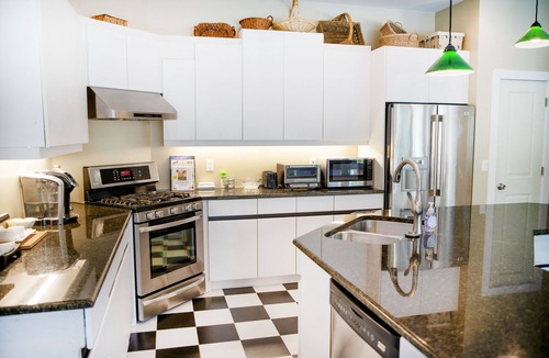 Lakewood House | TRAVELING FOR WORK POOL HOUSE w/heated pool and 2 hot tubs.