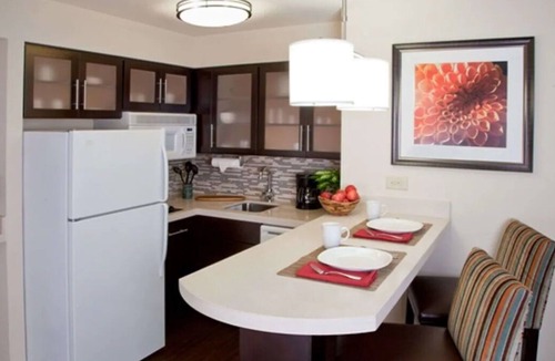 Acres Green House | Two 2BR Pet Friendly Suites Near Denver Art Museum w/ Kitchens! Outdoor Pool!