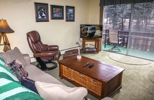 Estes Park Condo | Two Bedroom Condo with Fantastic View of Fall River from the Spacious Deck.