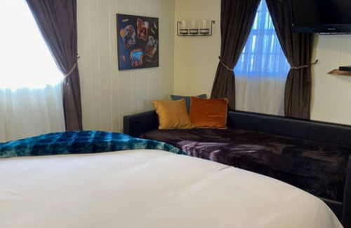 Cedaredge Cabin | Unit 9 at the Cedaredge Lodge: Creekside Comfort with a Touch of Mountain Magic.