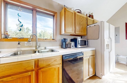 Glacier View Meadows House | View-worthy wilderness retreat with cozy fireplace