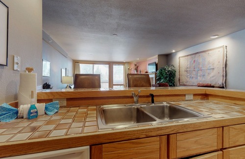 Mountain House Condo | Walk-to-slopes condo with fireplace - near shopping