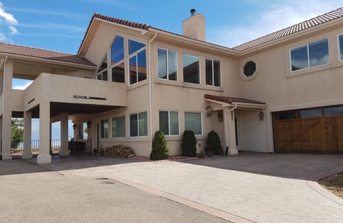 Southwest Colorado Springs Apartment | WALLS OF GLASS! Mountain top apartment, panoramic mt. views and city lights.