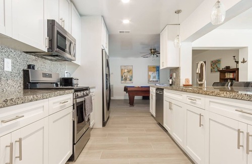 Garden Isles House | Waterfront Heated Pool + SUPs - 5BR Fun Stay!