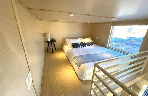Pear Park House | XL tiny home with two lofted queen beds and full size futon on the main level.