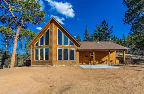 Florissant House | Your mountain getaway on 30 pristine acres! Beautiful home with hottub, stream.
