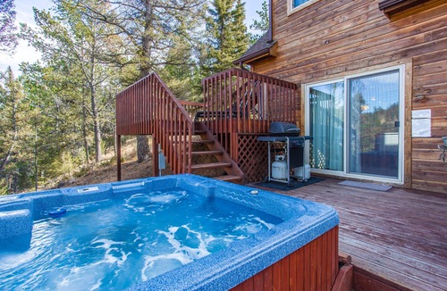 Florissant House | Your mountain getaway on 30 pristine acres! Beautiful home with hottub, stream.