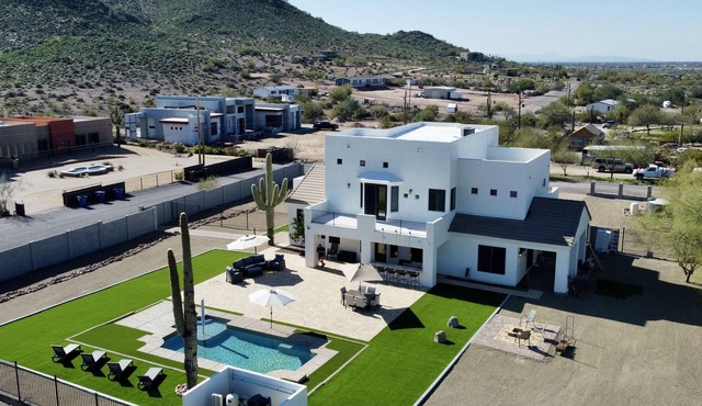 1+ Acre 5 Bedroom Desert Oasis with Pool and Mountain Views!