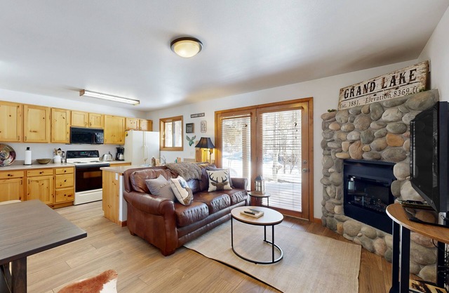 Creekside condo w/patio, fireplace & open layout perfect for a group getaway