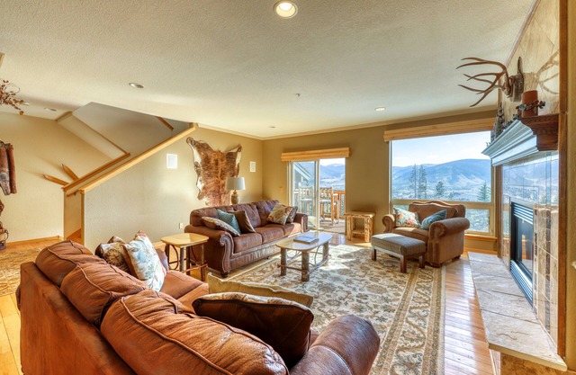 Elegant & spacious home with fireplaces, deck & garage access