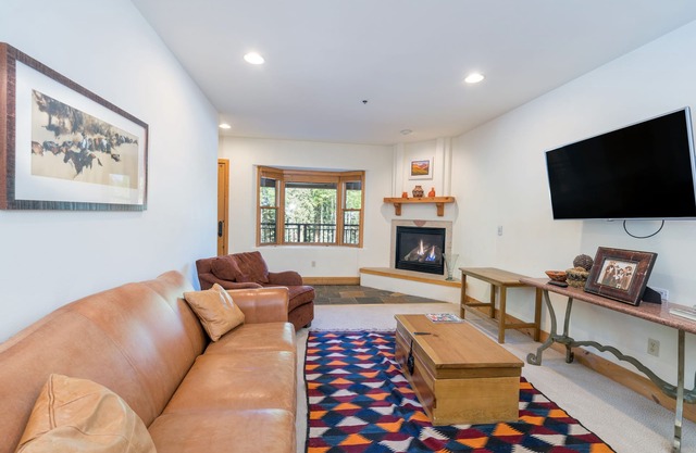 Family-Friendly 2-Bedroom Condo Tucked in the Woods