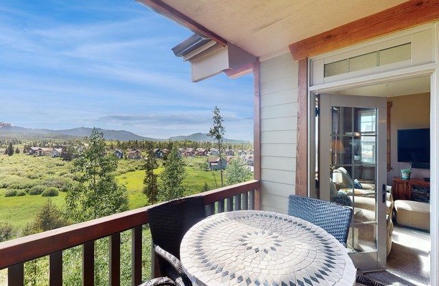 Mountain-view condo on ski shuttle route with deck & fireplace