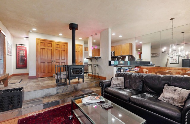 Renovated Creekside Condo w/Wood Stove & Shared Hot Tub/Pool - Steps to Shuttle