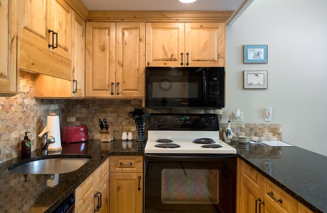 Ski-In/-Out Condo w/Vaulted Ceilings and Mt Charm!