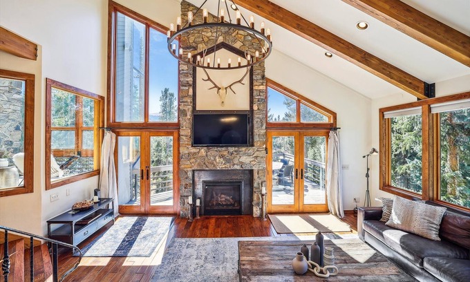Breckenridge House | Experience luxury at the Summit Solitude Estate, surrounded by stunning wooded views!