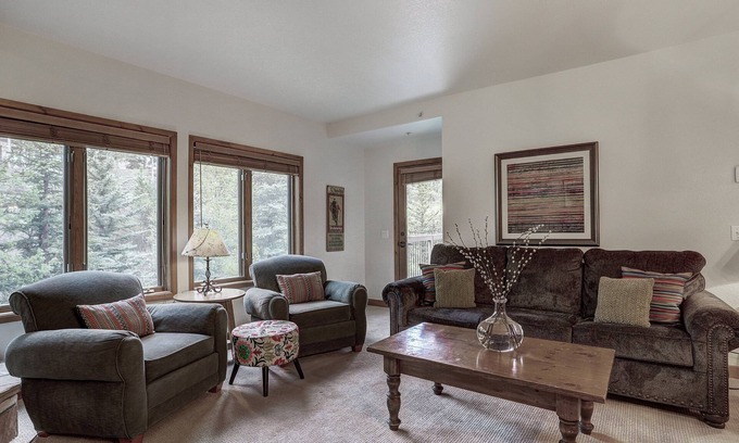 Four O'Clock Condo | Experience ski in/out cozy mountain living at Tyra Riverbend 213!