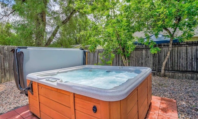 Central Colorado Springs Apartment | Heart Of Downtown, King Bed, Hot Tub, Has It All!