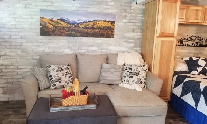 Glenwood Springs Condo | Homey and cozy with a large table for great feasts or epic card games.