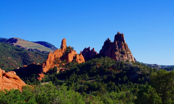 East Colorado Springs Apartment | Indulge in Home Like comfort! Pool, Full Kitchen, Near Pikes Peak Center!