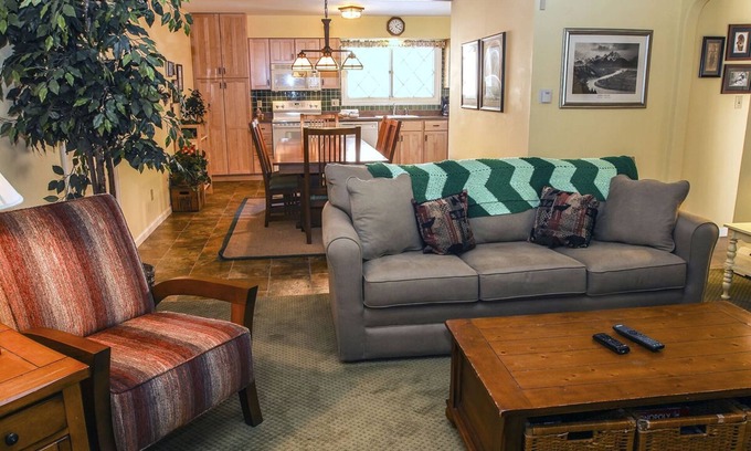 Estes Park Condo | Two Bedroom Condo with Fantastic View of Fall River from the Spacious Deck.