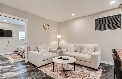 Aurora House | Chic, Modern and Cozy Basement with Garage