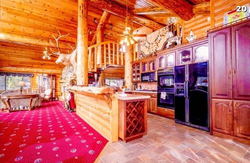 Bayfield House | Iconic Trout House Charming 4-bedroom Log Chateau 6 Fireplaces 5 Baths 5,250 Ft